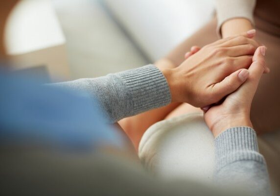 depositphotos_59965493-stock-photo-psychiatrist-hands-holding-palm-of
